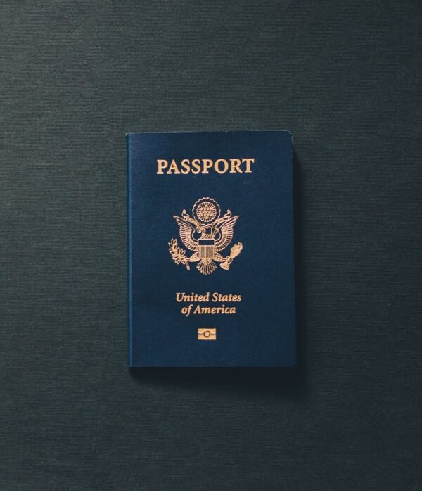 A passport sitting on top of a table.